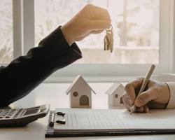 At closing signing papers and getting keys Closing