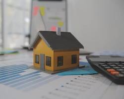 Paperwork and calculator on a desk Affordability